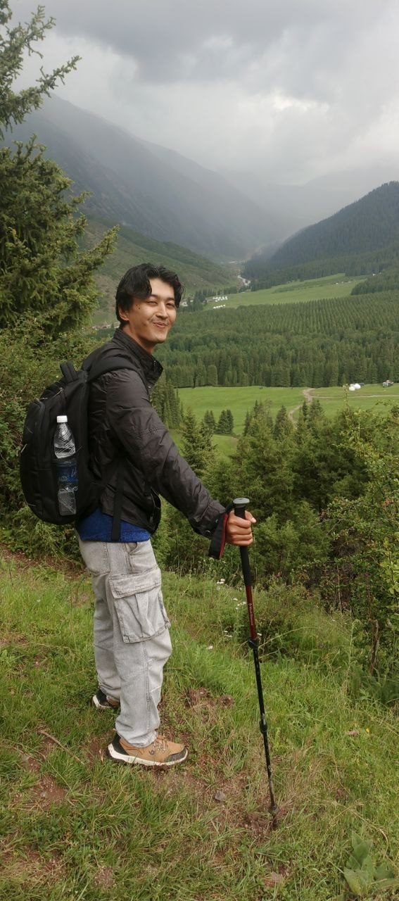 The son on a mountain trail in Kyrgyzstan